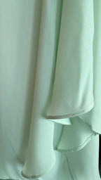 Close-up of light green fabric with a soft texture