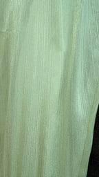 Close-up of light green fabric texture