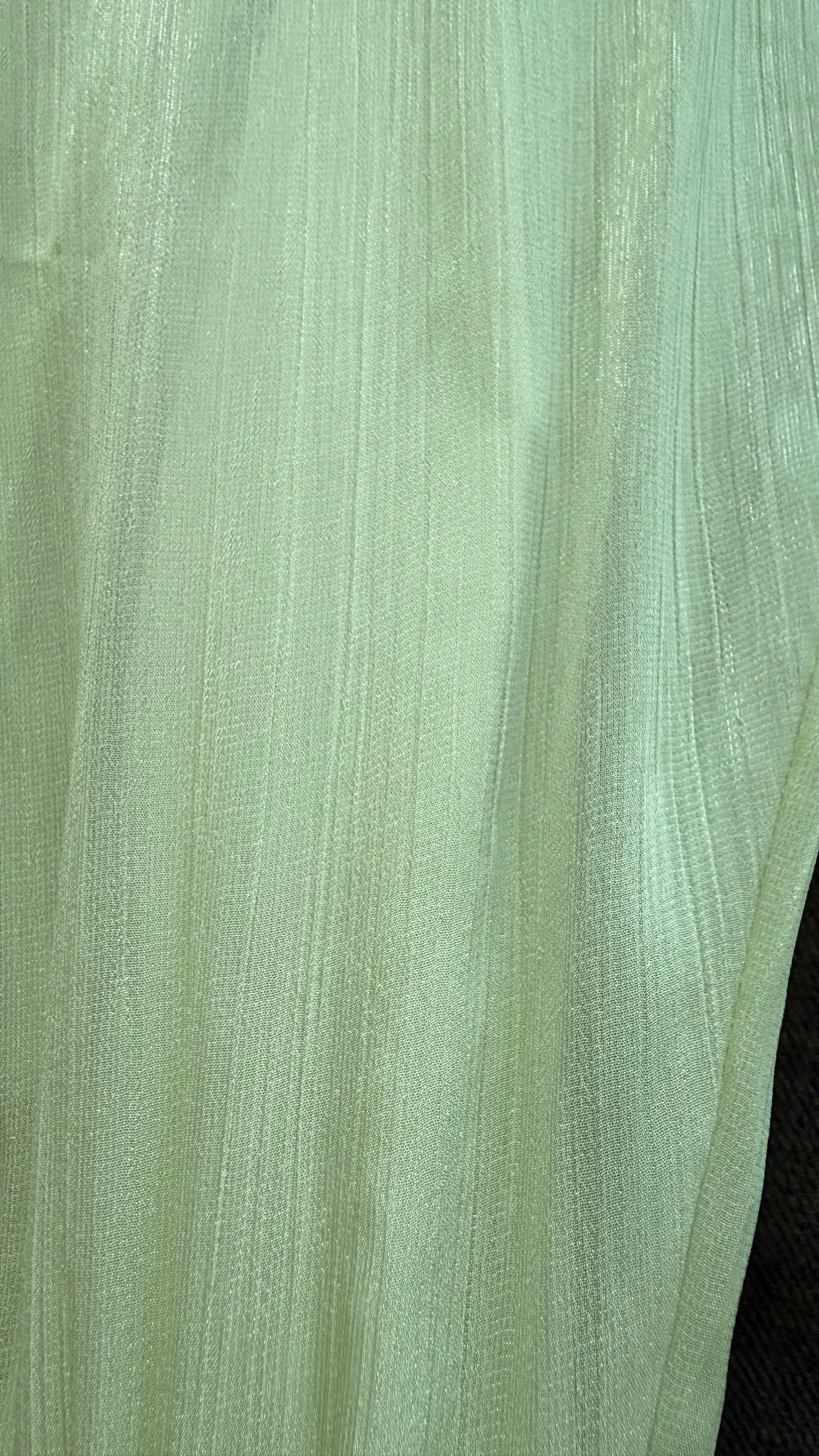 Close-up of light green fabric texture