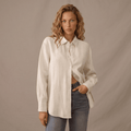 blond woman posing the model showing linen shirt
