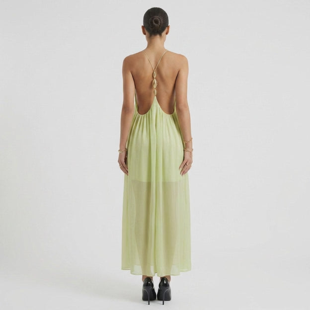 lady showcasing Beautiful dress opened from behind