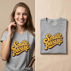 A split image showing a smiling woman wearing a heather gray graphic T-shirt on the left, and a folded view of the same T-shirt on the right. The shirt has a large retro-style yellow and orange 'Smile, please' graphic with a dark purple shadow on the chest, against a warm beige background.